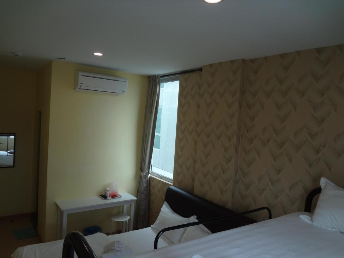 Comma Hotel Bandar Saujana Putra Buitenkant foto