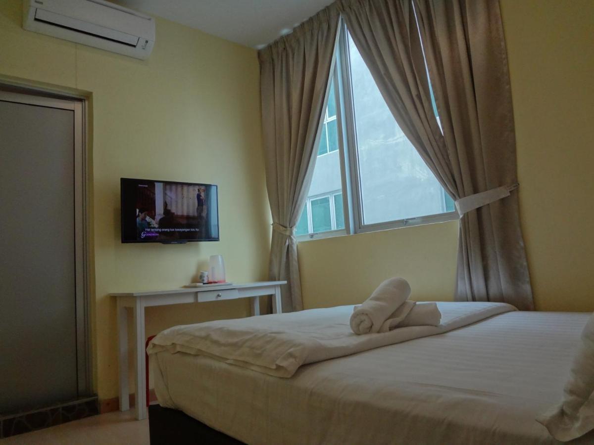 Comma Hotel Bandar Saujana Putra Buitenkant foto